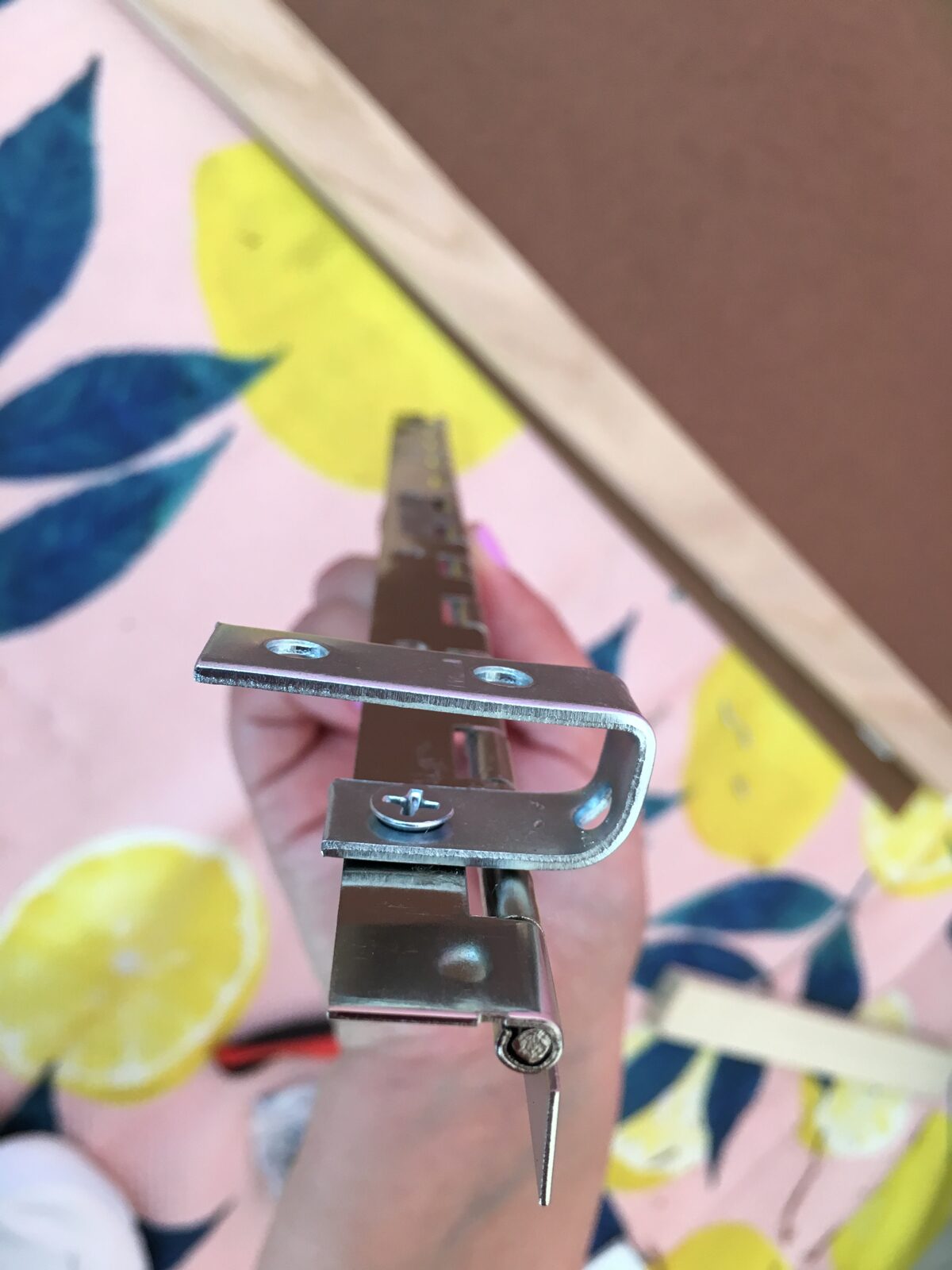 How to build a dog ramp tutorial - attach the U-brackets to the hinge using philps flat head screws