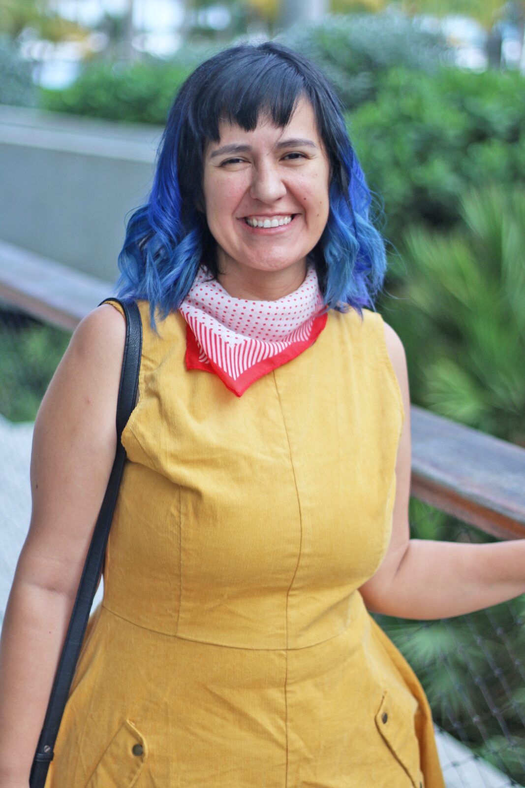 Mustard corduroy dress with red neck scarf and blue hair - Dapper Animals