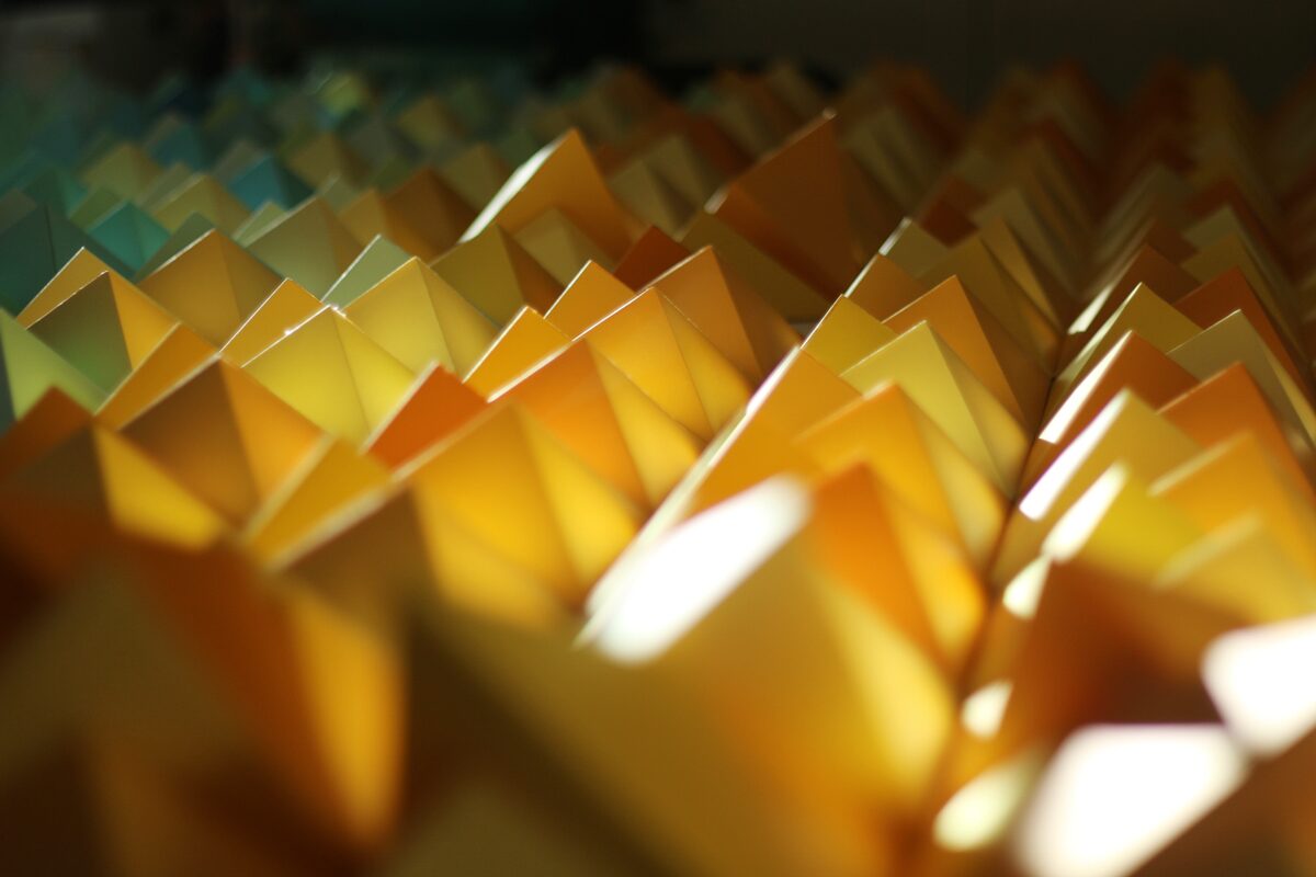 Origami Triangles Backdrop for stage and photos by Dapper Animals