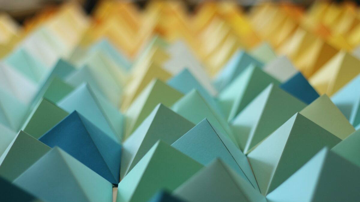 Origami Triangles Backdrop for stage and photos by Dapper Animals