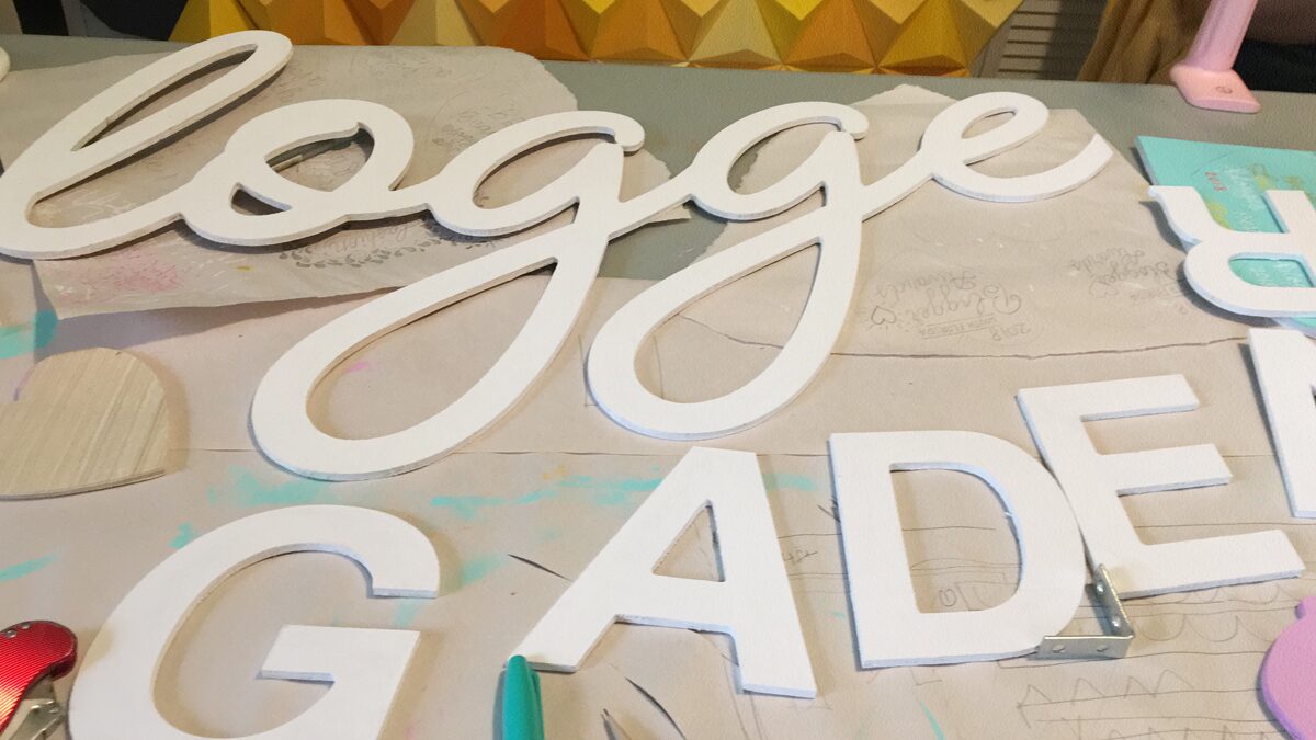 Origami Triangles Backdrop for stage and photos by Dapper Animals