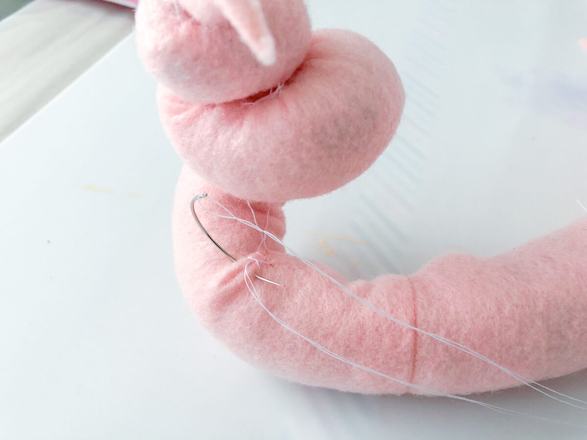 Felt Ice Cream Pin Cushion Tutorial use a curved needle to sew the wrinkles together