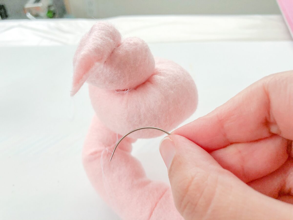 Felt Ice Cream Pin Cushion Tutorial use a curved needle to sew the wrinkles together